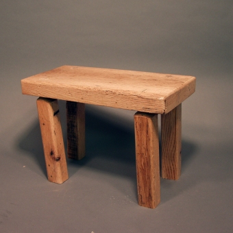 Eccentric 'walking' wooden stool